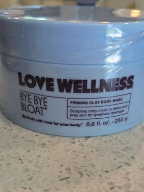 Love Wellness Bye Bye Bloat Firming Clay Body Mask - Light Blue Jar